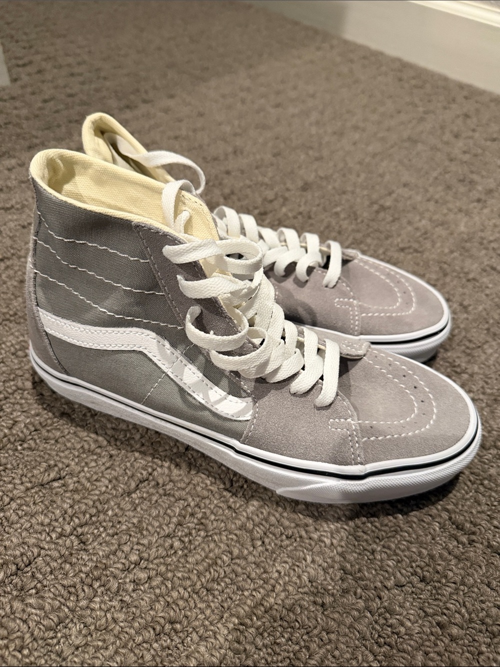 Gray High-Top Vans Sneakers with White Stripe